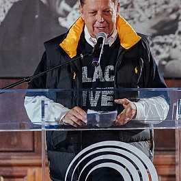 Portrait of Rev Pfleger at Rainbow Push speaking at the Helen Burns Jackson Memorial 532px by 800px